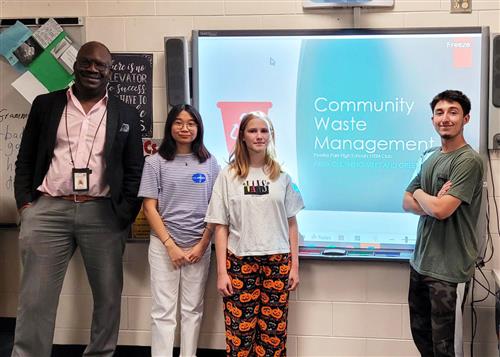 Photo: Teacher Joe (Lafrance) Clarke, Bella Nguyen, Alice Davis, and Kaiden Salyers